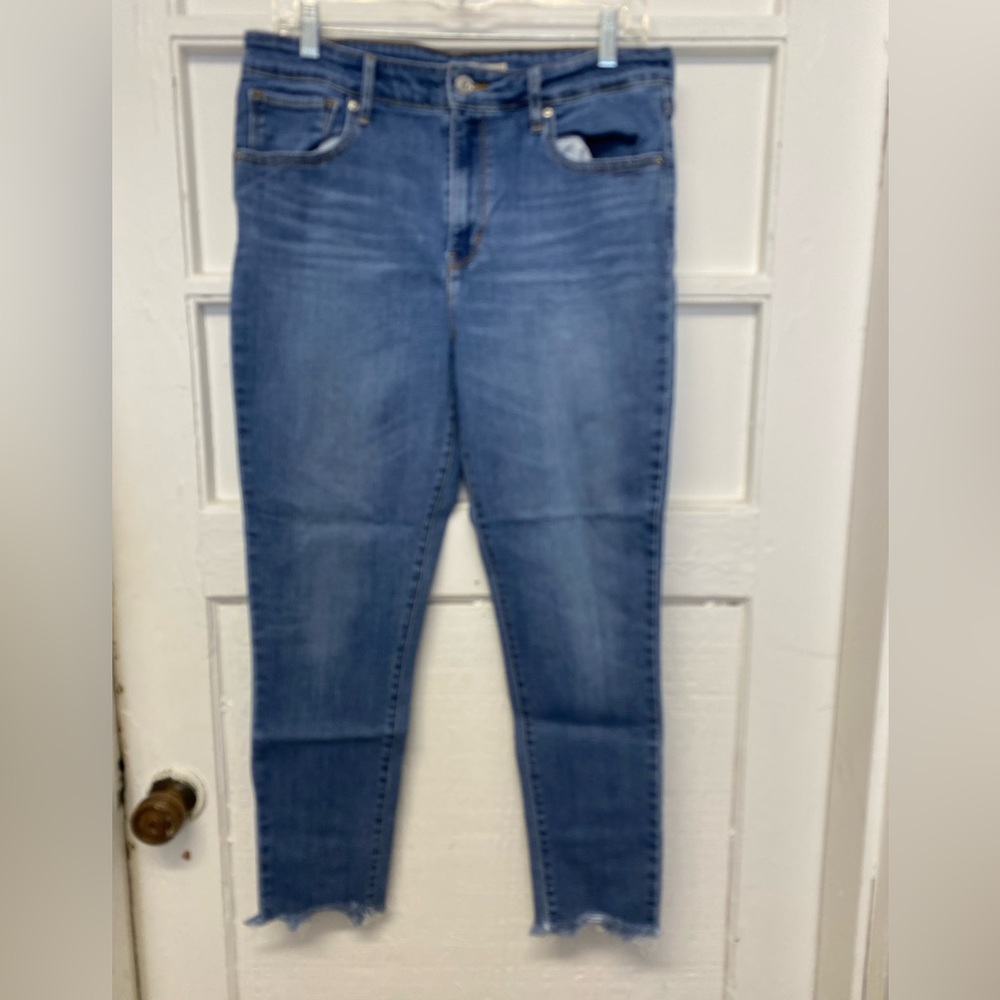 Levi’s 721 high rise skinny ruffed edge  ankle jeans women’s size 32